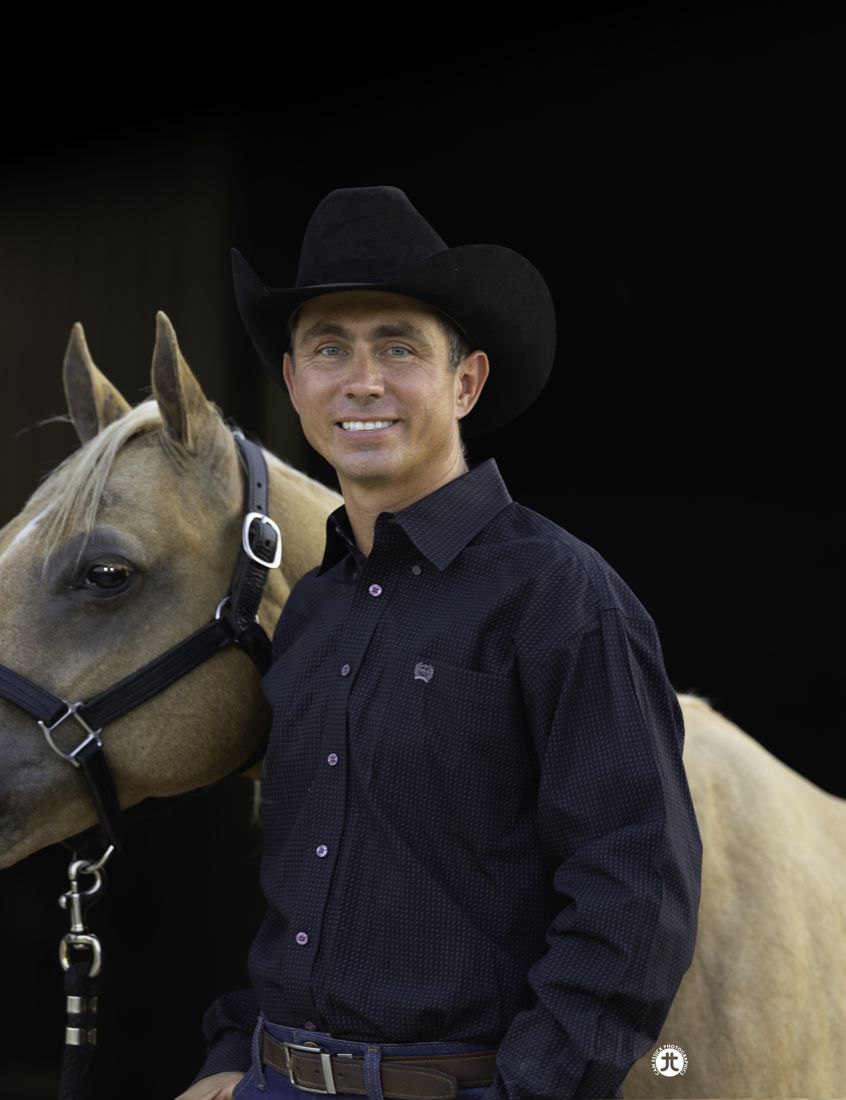 Dr. Matt Parsons with a palomino mare