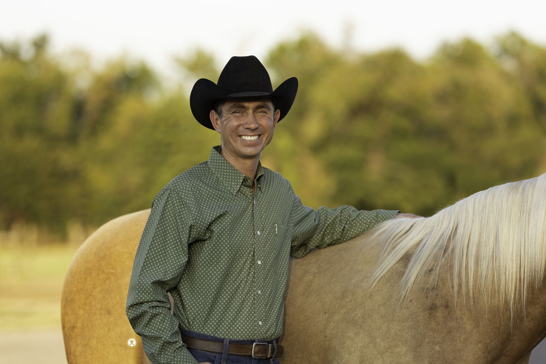 Dr. Matt Parsons with a palomino recipient mare