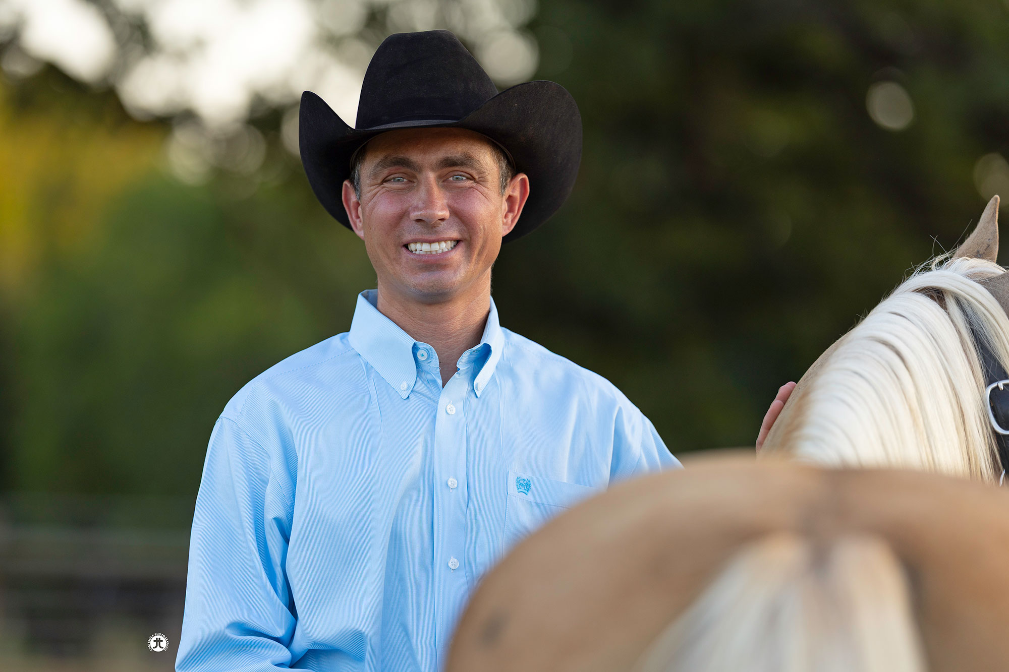 Dr. Matt Parsons with a palomino mare