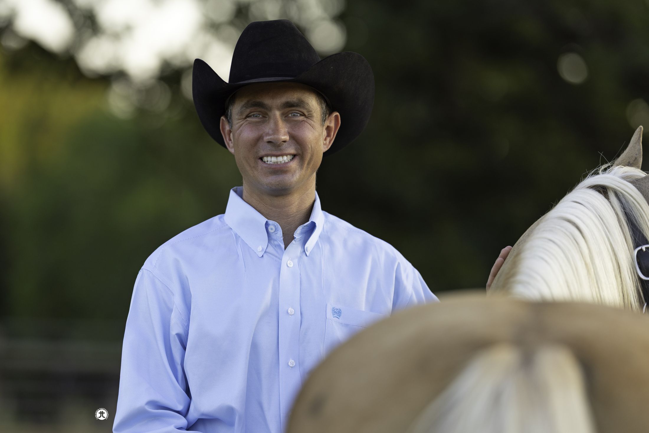 Dr. Matt Parsons with a palomino mare